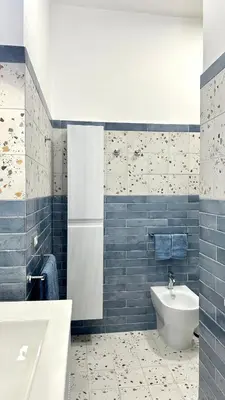 a bathroom with a tub and a toilet and a sink at AliHouse Apartment in Rome