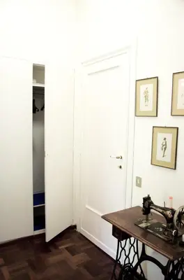 a bathroom with a sink and a mirror at Dolcevita suite in Rome