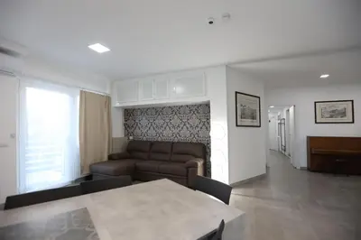 a living room with a couch and a table at Sweet Home Fleming in Rome