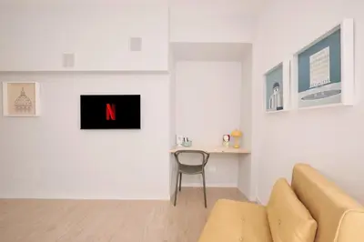 a living room with a couch and a table at Pop Domus Guest House o Affittacamere in Rome