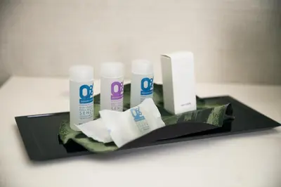 a black tray with a bunch of products on it at Campo De’ Fiori Prestige Rooms in Rome