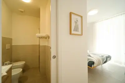 a bathroom with a toilet and a sink at Domus Paruta in Rome