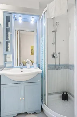 a bathroom with a sink and a shower at Betti Classic Home in Rome
