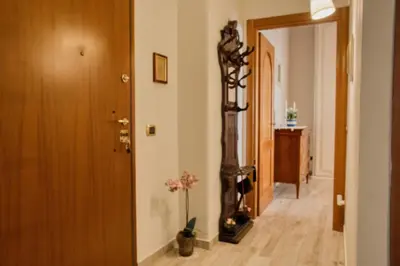 a room with a hallway with a guitar in it at Pigneto84 in Rome