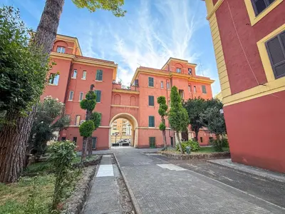 a large brick building with an arch in front of it at Feffo's home - Casa per 4 persone in Rome