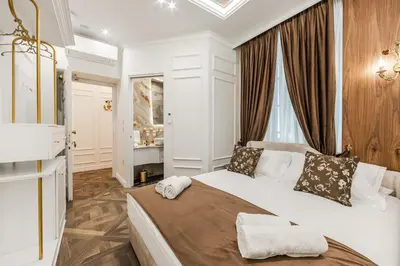 a bedroom with a large bed in a room at La Bella Trevi in Rome