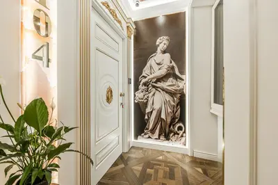 a statue of a woman in a door in a hallway at La Bella Trevi in Rome