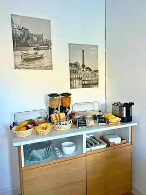 a shelf with food on top of it at GLhouse Roma Mazzini in Rome