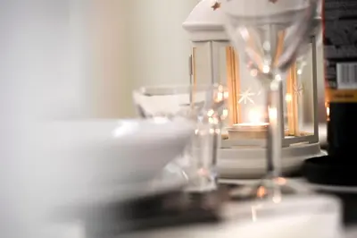 a close up of a table with a candle and a mirror at Il Mattoncino - Colosseo in Rome