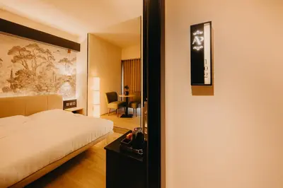 a hotel room with a bed and a desk at Guest House Praesidium in Rome