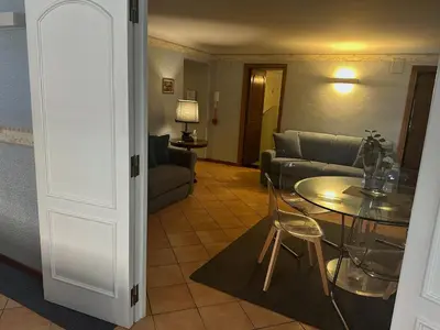 a living room with a table and a couch at Apt Aurea Domus al Pantheon in Rome