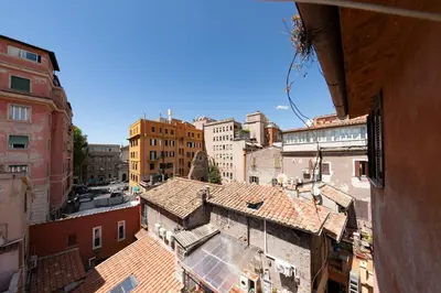 an overhead view of a city with buildings at Casa Mia - Trastevere Rooftop Nest in Rome