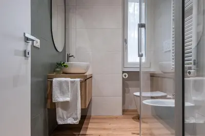 a bathroom with a sink and a toilet at Casa Bressan in Rome
