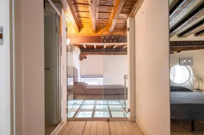 a view of a bedroom from the hallway of a house at Navona award Collection in Rome