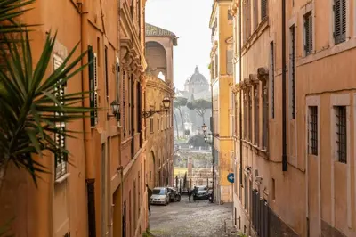 a view of an alley between two buildings at Velantia Fori Apartment in Rome