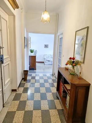 a living room with a checkered floor at Flaminio Charme in Rome