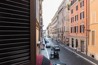 a view of a city street from a window at Persia Collection Ripetta in Rome