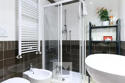a bathroom with a shower and a sink at Nuovo appartamento stazione Tiburtina in Rome