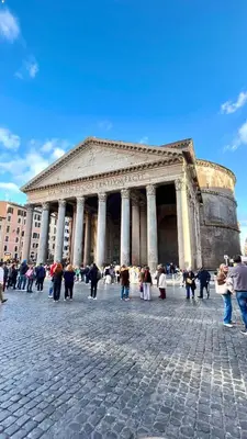 a group of people standing in front of a building at Pantheon Luxury Jacuzzi Apartment in Rome