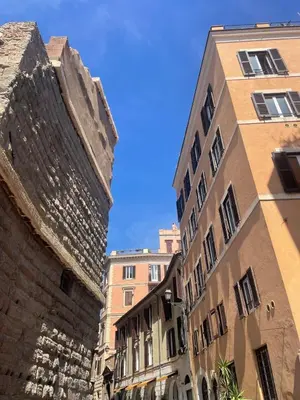 two tall buildings next to each other on a street at Monti Mood Design Apt - via Urbana - BRAND NEW in Rome