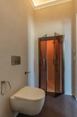 a bathroom with a toilet and a shower at Porta Trastevere Palace in Rome