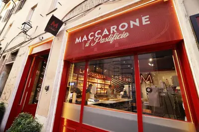 a store front of a store with a sign on it at Casa Mirella near Piazza Navona, Rooftop Views in Rome