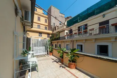 a view of an alley between two buildings at My Monti Charming Holiday Home in Rome