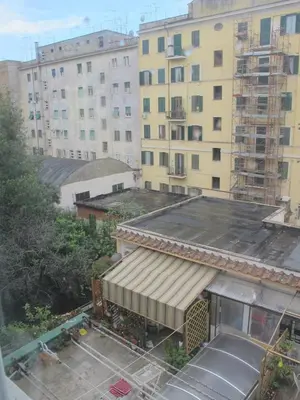 an overhead view of a building with buildings in the background at GattaGuest in Rome