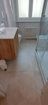 a bathroom with a sink and a toilet at Casa Carmine in Rome