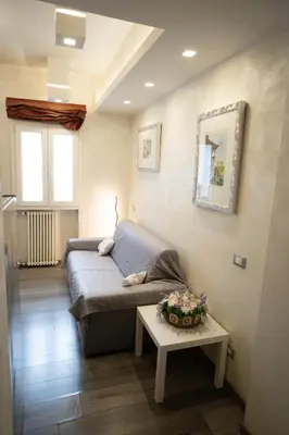 a living room with a couch and a table at Monteverde Charme -ROMA- in Rome