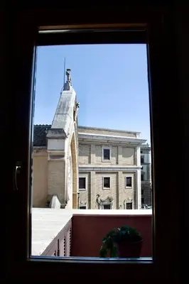a view of a building from a window at San Vito Cozy Apartment in Rome