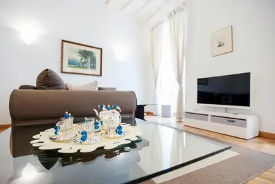 a living room with a couch and a coffee table at S.Andrea in Rome