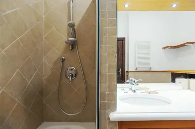 a bathroom with a shower and a sink at Lungaretta3 in Rome