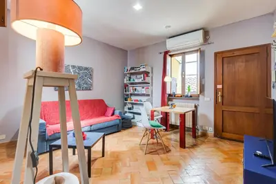 a living room with a couch and a table at Campo Marzio Boutique Apt 300 mt dal Pantheon in Rome