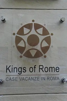 a sign for the kings of rome case vacance in roma at Kings Of Rome Apartments in Rome
