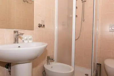 a bathroom with a sink and a shower at Best Suites Pantheon in Rome