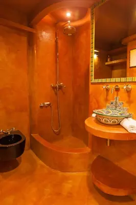 a bathroom with a tub and a shower and a sink at Wake At Rome in Rome
