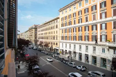 a view of a city street with cars and buildings at Rome Armony Suites in Rome