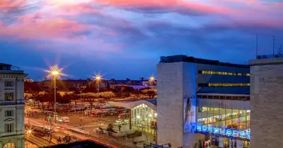 a view of a city at night at Gioberti Art Hotel in Rome