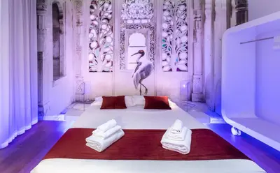 a room with a large bed with two white towels at Trevi Elite Rome in Rome