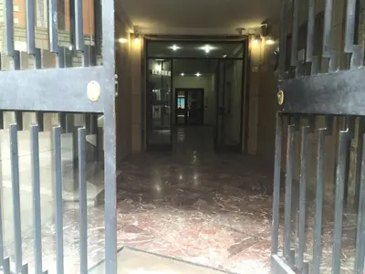 a hallway with a gate in a building at Sofia Holiday Home in Rome