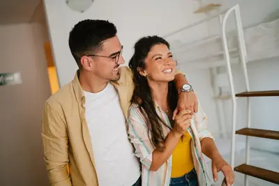 a man and a woman standing in a room at NEW GENERATION HOSTEL Rome center in Rome