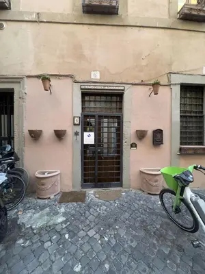 a bike parked in front of a building at Romantic Piazza Navona Hideaway in Rome
