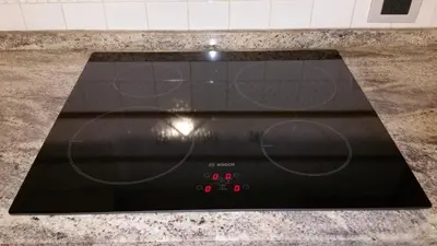 a stove top oven sitting on top of a counter at La Casa Del Pigneto in Rome