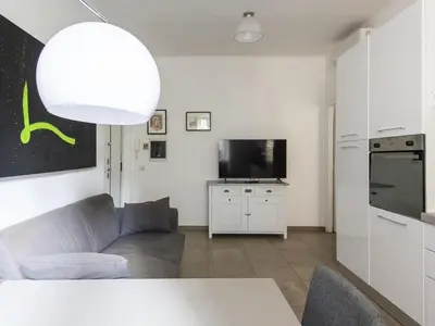 a living room with a couch and a tv at Apartment Il Piccolo by Interhome in Rome