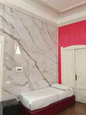 a bathroom with a sink and a toilet at Il Tempio Della Capitale in Rome