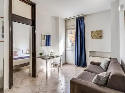 a living room with a couch and a table at Apartment Wohnung mit Wi-Fi by Interhome in Rome