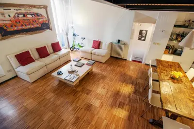 a kitchen with wooden cabinets and a counter top at Portico in Rome
