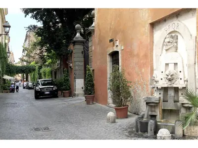 a car parked on a street next to a building at Apartment Margutta in Rome