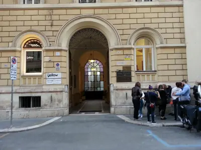 a group of people standing outside of a building at Marziah Inn in Rome